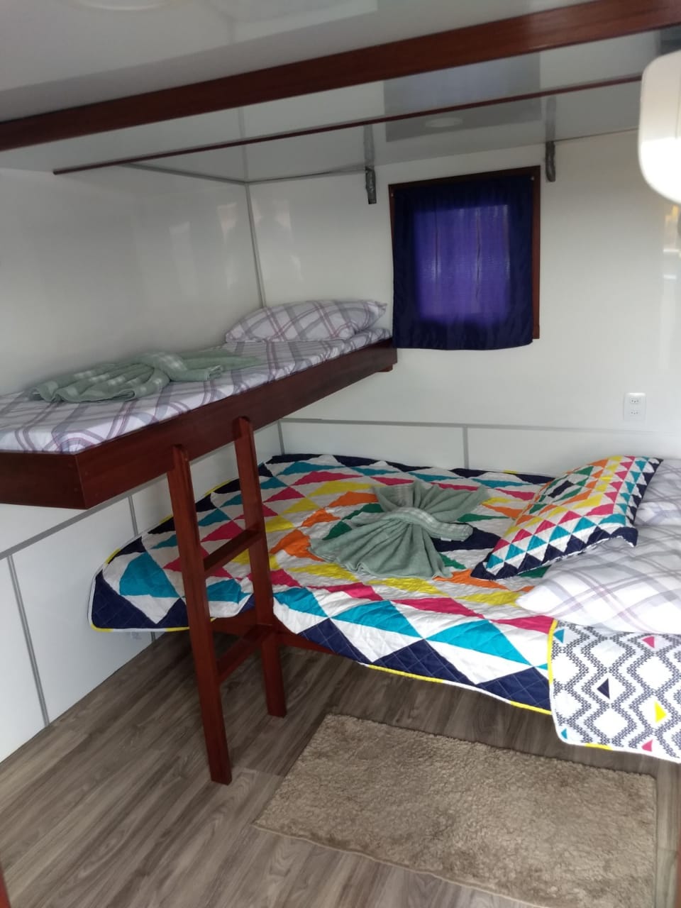 Private cabin aboard the Amazon riverboat with comfortable bunk beds
